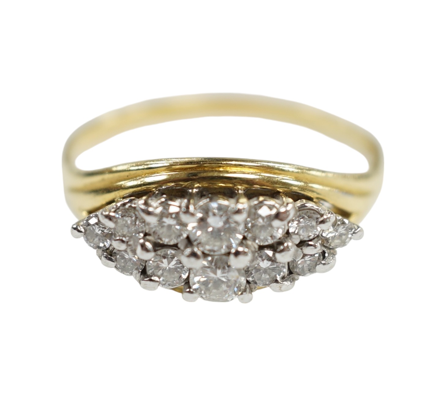 A modern 18ct gold and navette shaped diamond cluster set ring, size Q, gross weight 4.4 grams. Condition - fair